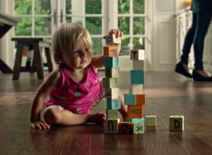 Baby with Blocks on Floor